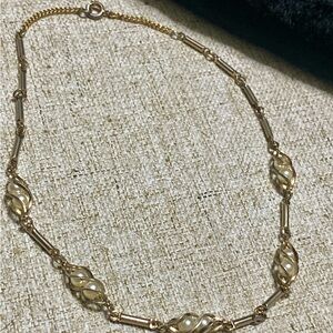 Vintage Gold and Cream Necklace with Intricate Design